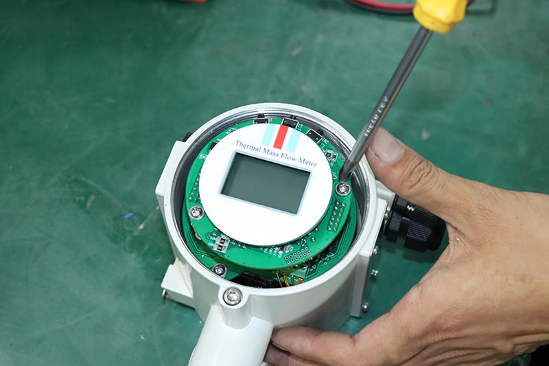 Flow and energy measuring instrument thermal mass flow meters